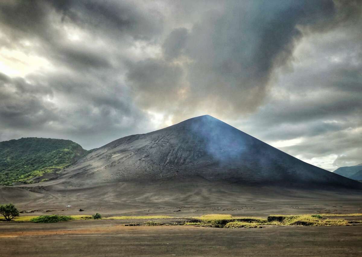 Will Smith and Erik Weinhenmayer drive up to the brooding volcanic hulk of Mount Yasur on the island of Tanna.