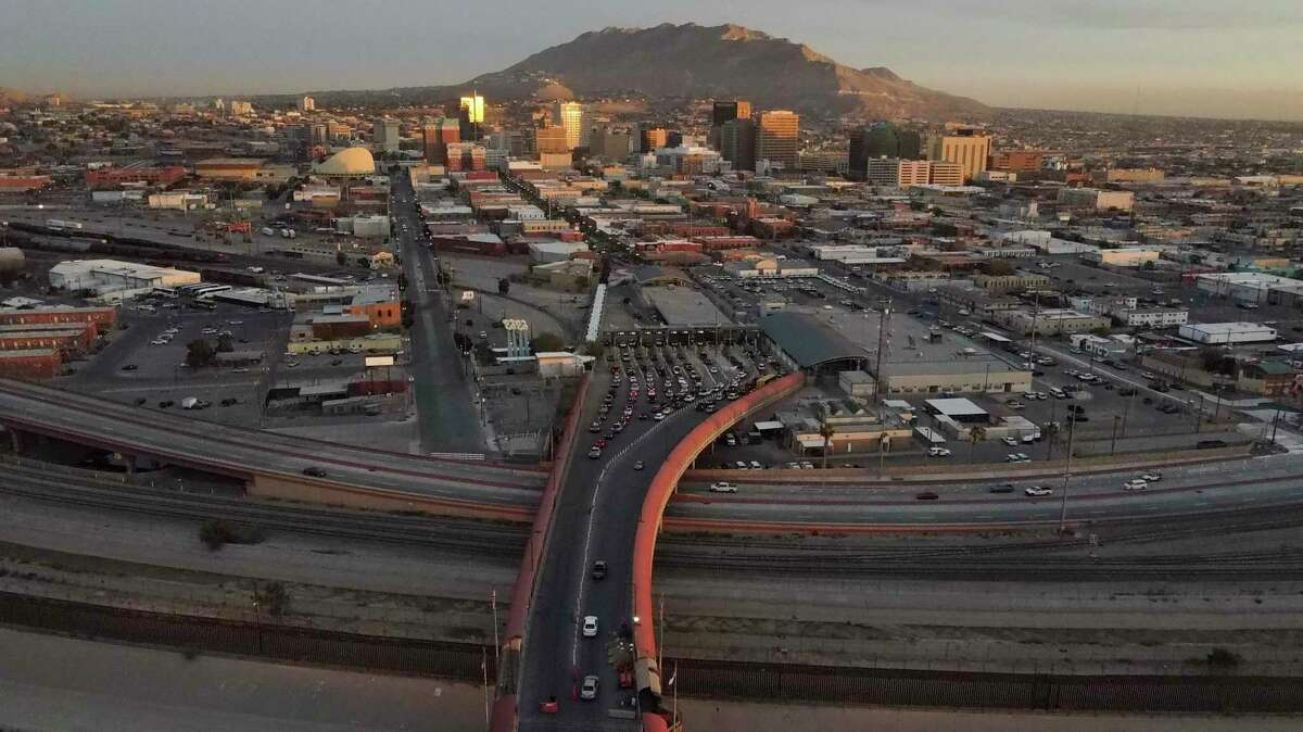 Cars line up at the Paso del Norte International bridge in Ciudad Juarez, Mexico, below, on the border with El Paso, Texas, top, Monday, Nov. 8, 2021. The U.S. fully reopened its borders with Mexico and Canada on Monday and lifted restrictions on travel that covered most of Europe amid the COVID-19 pandemic.