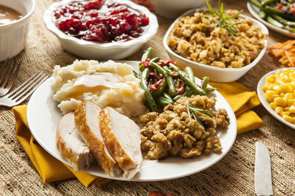FILE - A Thanksgiving meal displayed on a table.