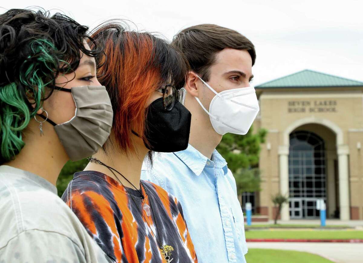 Seven Lakes High School students Gabriela Acosta, left to right, Mage Cy and Cameron Samuels posed for a photograph outside the school on Monday, Oct. 11, 2021, in Katy. The group of students are concerned that Katy ISD is blocking specifically LGBTQ+ websites like the Trevor Project and Outsmart Magazine on the school WiFi.