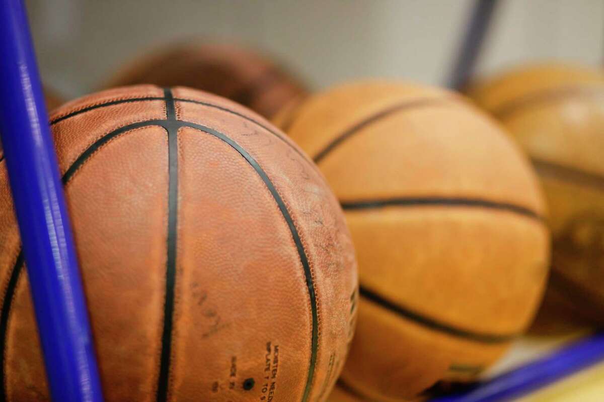 close-up views of basketballs on a rack