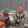 FILE - Ken Haustein of Midland and his daughter Corie Oberson of Auburn admire the three-point buck Haustein shot as the pair hunted together in Midland County in 2020.