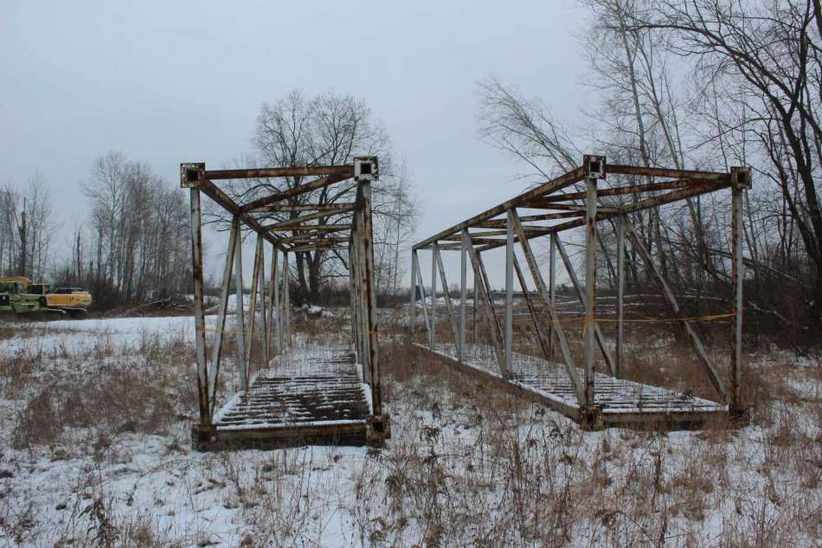 In this file photo, a pedestrian bridge is pictured on a lot owned by Switzer Sand and Gravel. Green Charter Township's pedestrian bridge project has been put on hold due to various legal issues.