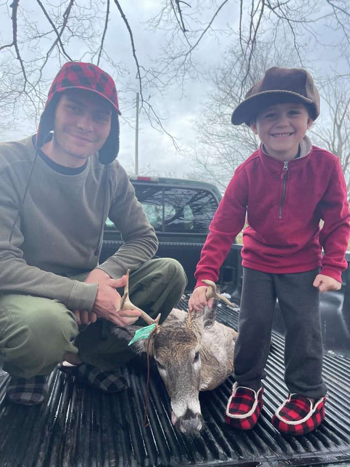 "Opening day: My son Kevin told his dad he wanted to see a buck yesterday morning. Well dad delivered and the smile says it all!!!!!! Food in the freezer for this 7pt.