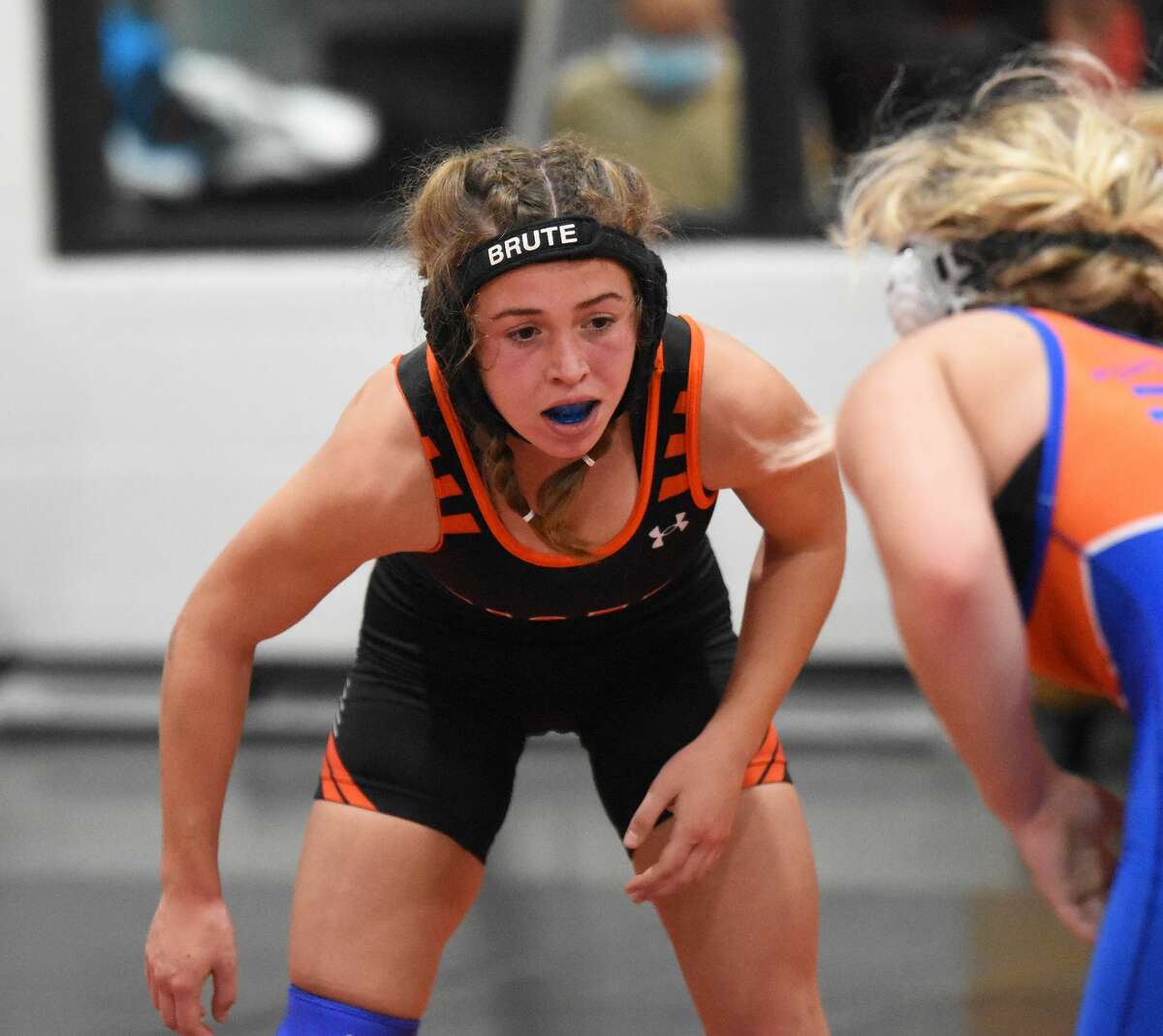 Edwardsville's Olivia Coll catches her breath during her match inside the Jon Davis Wrestling Center in Edwardsville. Coll went 3-2 in the 101-pound weight class of the Wonder Woman Tournament.