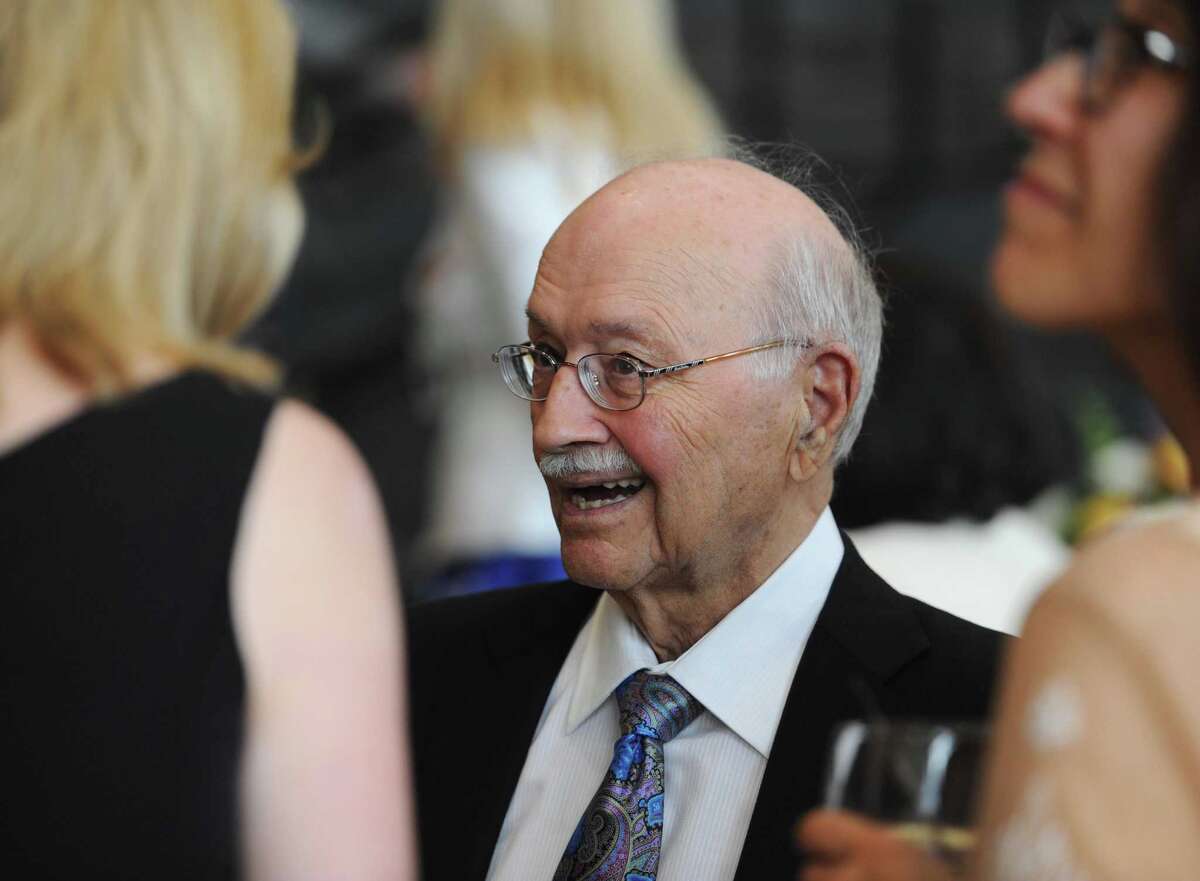Subway founder and Danbury resident Peter Buck chats during the dedication party and ribbon-cutting for the new Peter and Carmen Lucia Buck Pavilion addition to the Danbury Hosptial in Danbury, Conn. Friday, June 20, 2014.