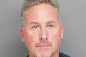 Veteran Bridgeport cop arraigned on theft charges - Photo