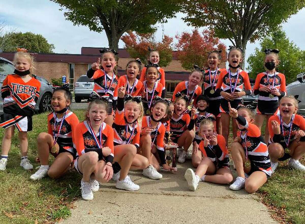 The Ridgefield Tigers, a youth cheerleading quad, recently came home with two first-place trophies from local and state competitions.