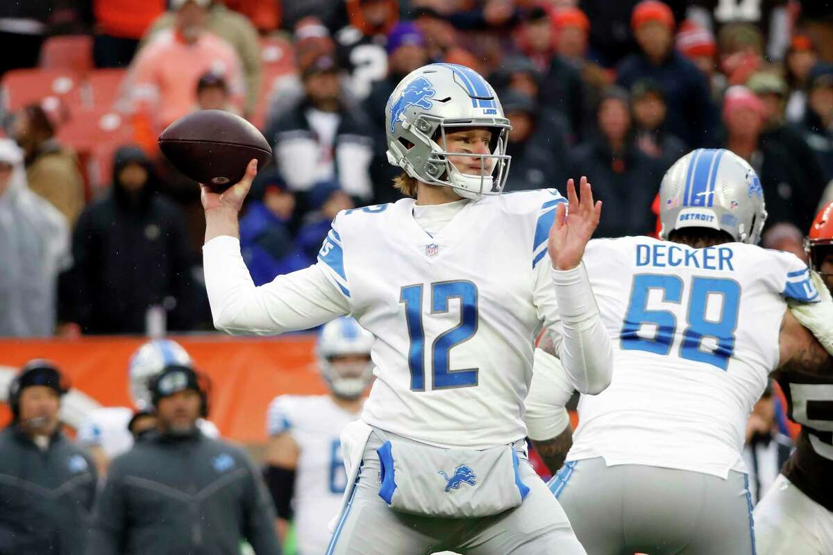 Detroit Lions quarterback Tim Boyle (12) throws the ball during an NFL football game against the Cleveland Browns, Sunday, Nov. 21, 2021, in Cleveland. (AP Photo/Kirk Irwin)