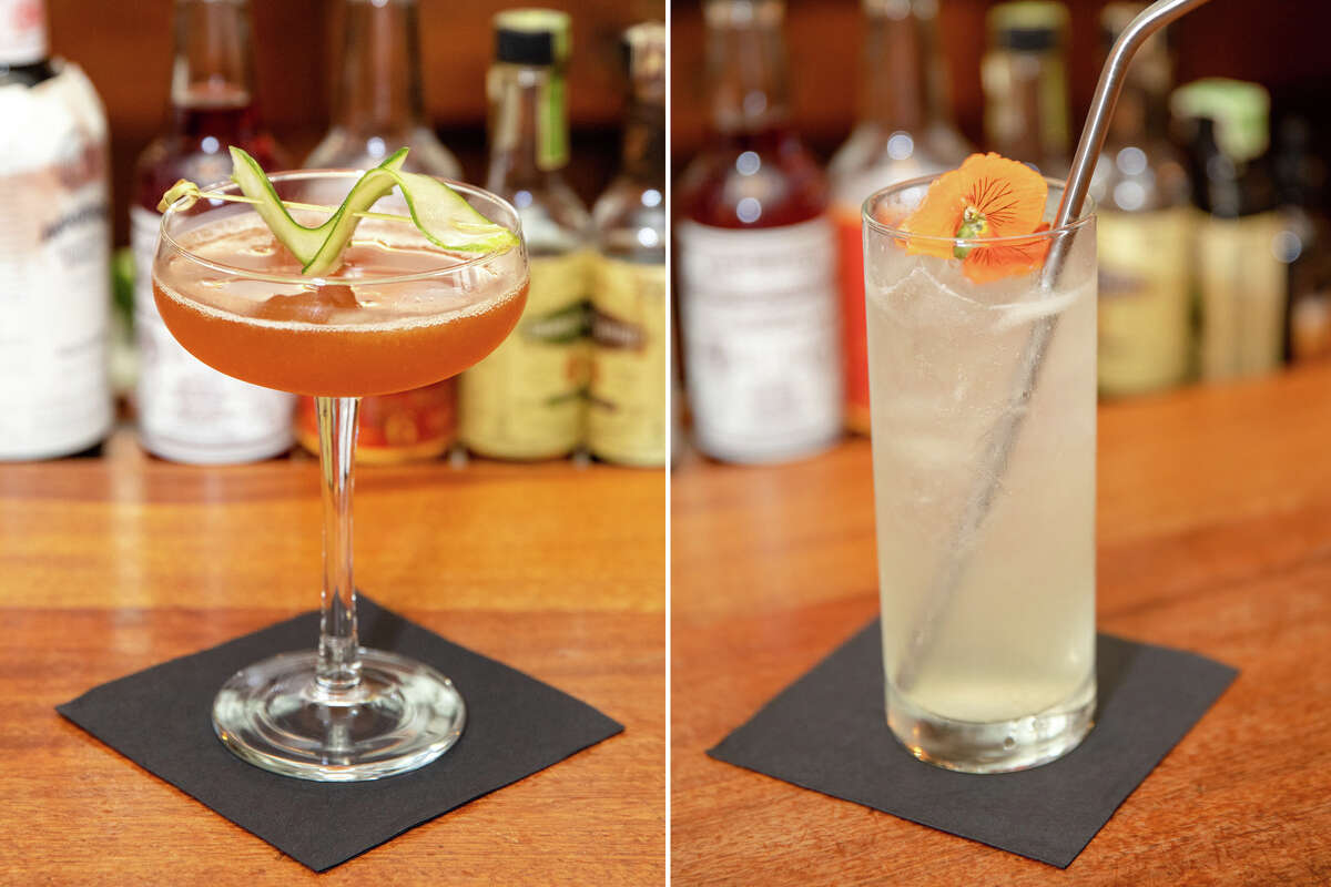 (Left) The Ella, with Pim's Cup Gin, strawberry and cucumber shrub, lemon juice and simple syrup and (right) Down in the Valley, with vodka, Caperitif, elderflower liqueur, lime juice, simple syrup and club soda are two of the signature cocktails at the William Tell House in Tomales, Calif. on Nov. 18, 2021.