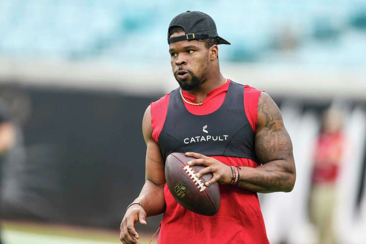 San Francisco 49ers linebacker Dre Greenlaw (57) runs a drill during warm-ups before an NFL football game against the Jacksonville Jaguars, Sunday, Nov. 21, 2021, in Jacksonville, Fla. (AP Photo/Gary McCullough)