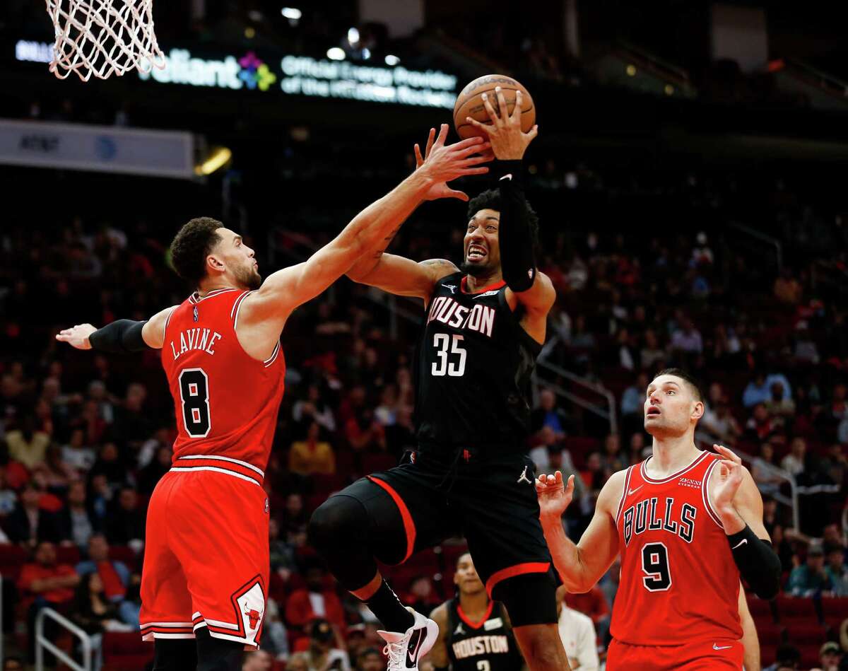 Houston Rockets center Christian Wood (35) is fouled by Chicago Bulls guard Zach LaVine (8) during the fourth quarter of an NBA game at Toyota Center on Wednesday, Nov. 24, 2021, in Houston. The Rockets won 118-113.