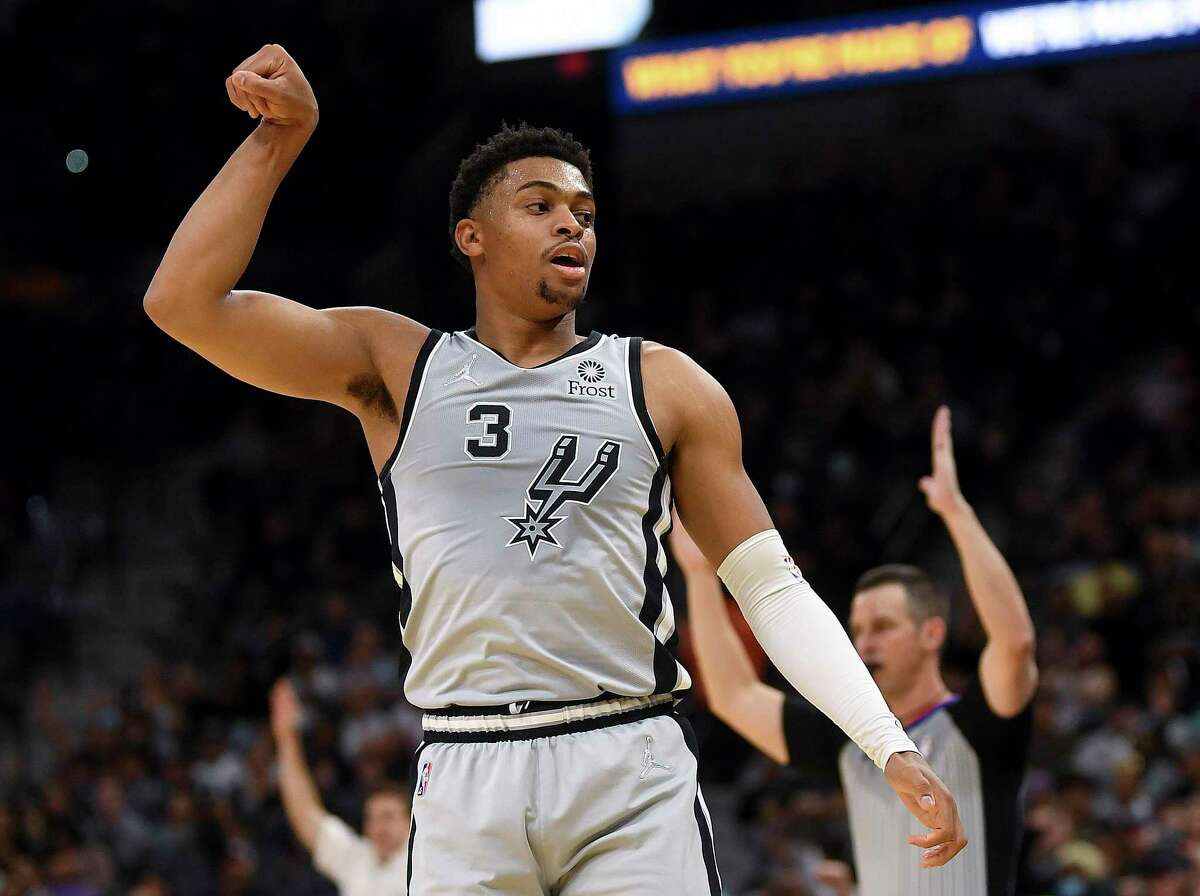 Keldon Johnson of the San Antonio Spurs celebrates after scoring on a first-half three-point shot during NBA action against the Atlanta Hawks in the AT&T Center on Wednesday, Nov. 24, 2021.