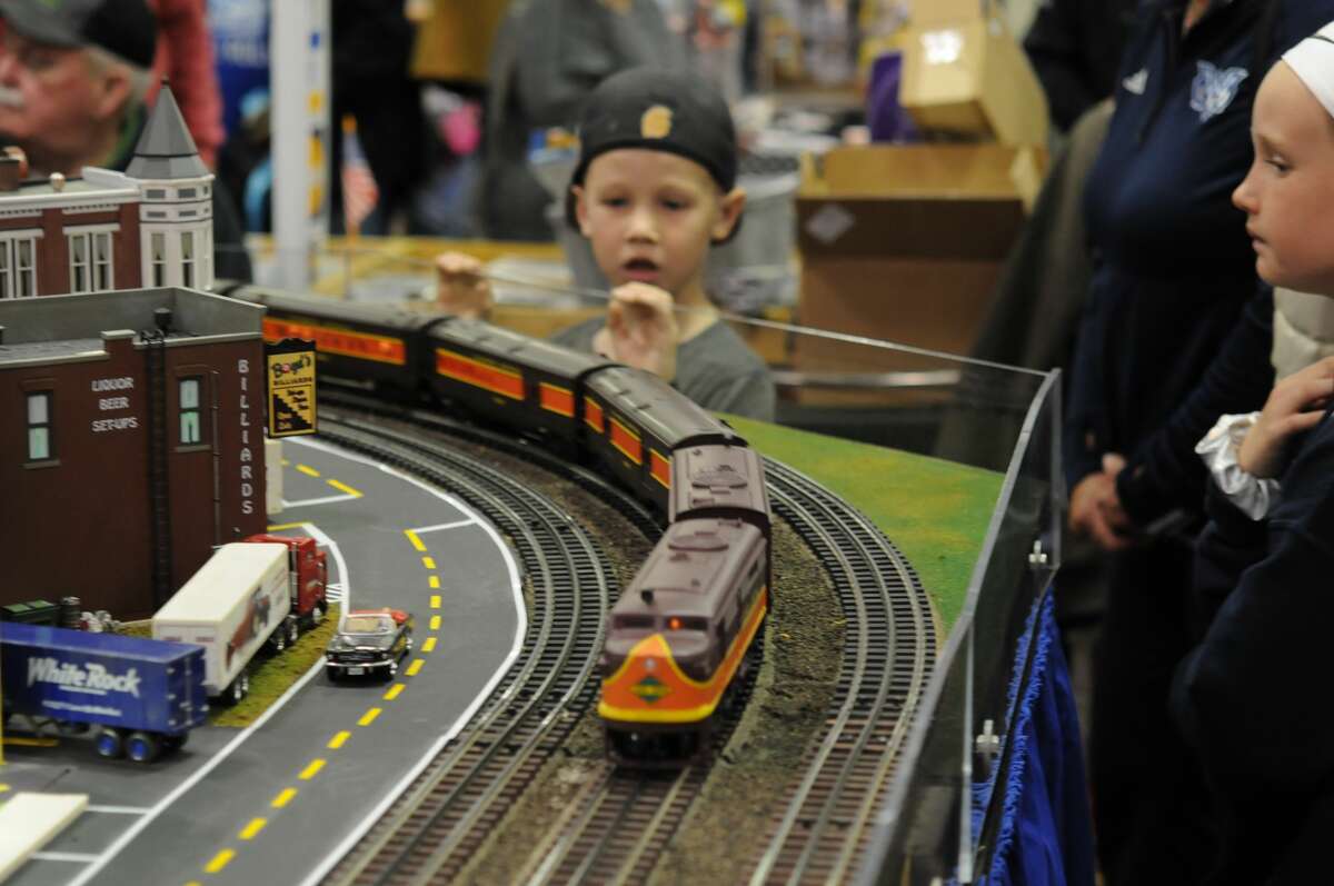 K.J. Trufant  of Columbus, Mississippi, watches one of the layouts at the Great Train Expo in Collinsville in 2019. After a pandemic pause last year, the massive show returns to Gateway Center Saturday and Sunday.