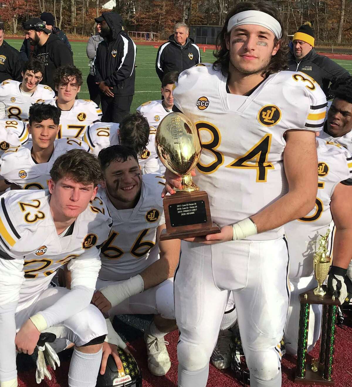 Law captain Lucas Pincus-Coyle received the Mayor's Trophy after the Lawmen defeated Foran 21-14.