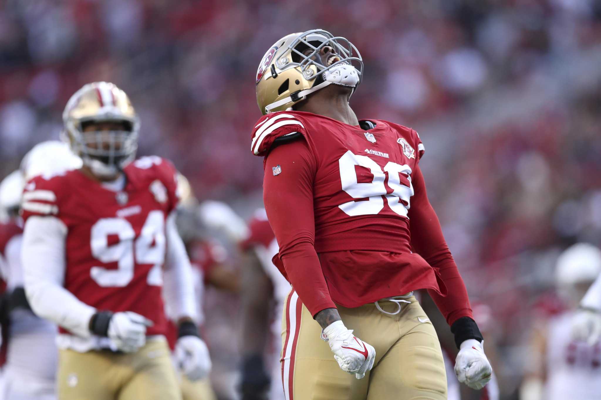 San Francisco 49ers Arden Key (98) reacts on the sideline during