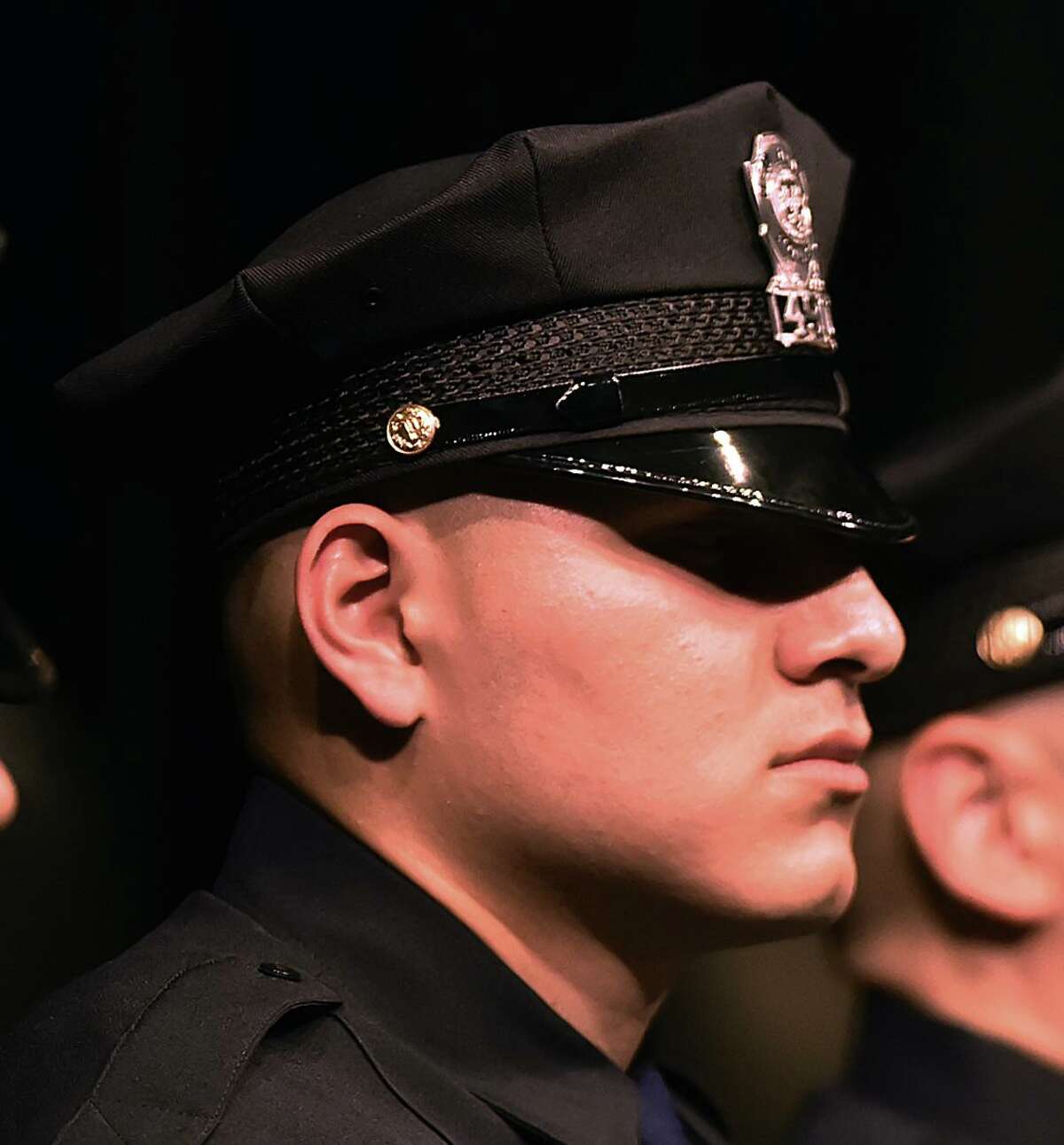 Officer Gary E. Gamarra during a 2017 ceremony for his class of officers at the New Haven Police Academy. Gamarra was stripped of his police certification earlier this month after allegedly coercing two women into sexual relationships.