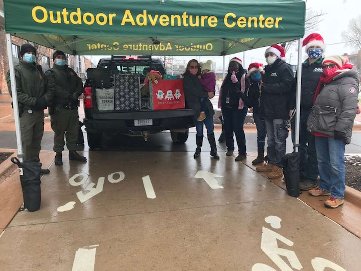 Conservation officers at the curbside 2020 Stuff-a-Truck event located at the DNR Outdoor Adventure Center; officers collected more than 330 toys. Conservation officers will host a 2021 curbside event at the DNR Outdoor Adventure Center Friday, Nov. 26, 10:30 a.m. to 3 p.m., Saturday, Nov. 27, 10:30 a.m. to 4 p.m. and Saturday, Dec. 4, 10:30 a.m. to 4 p.m.