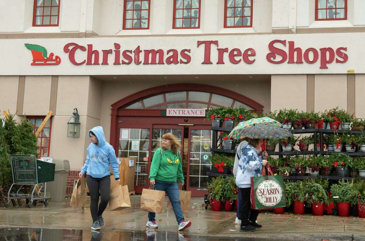 Black Friday bargain seekers are seen leaving the Christmas Tree Shops store in Colonie Center on Friday, Nov. 26, 2021 in Colonie, N.Y.