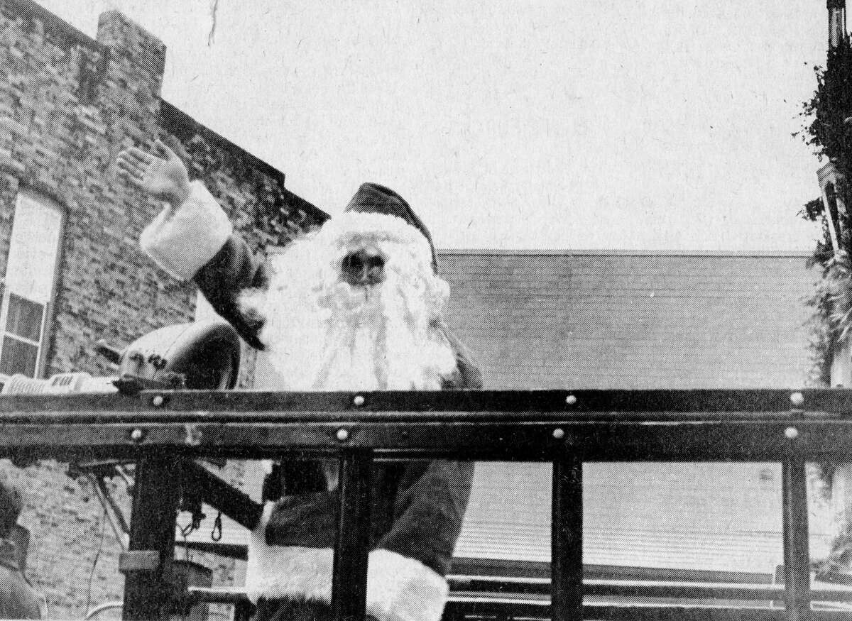 Santa kicked off the Christmas season today with his arrival in downtown Manistee. Santa’s visit was sponsored by Manistee area merchants. The jolly old guy appeared to be in good spirits as he waved to post-Thanksgiving shoppers. The photo was published in the News Advocate on Nov. 27, 1981.