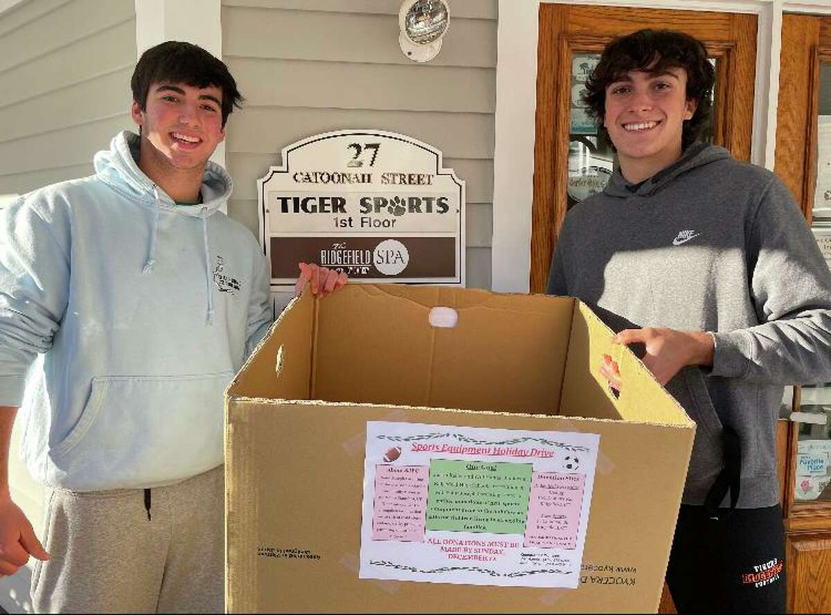 Ridgefield High School juniors Will Hanna, left, and Justin Keller are organizing a sports equipment drive to benefit families served by the Saint Joseph Parenting Center in Stamford.
