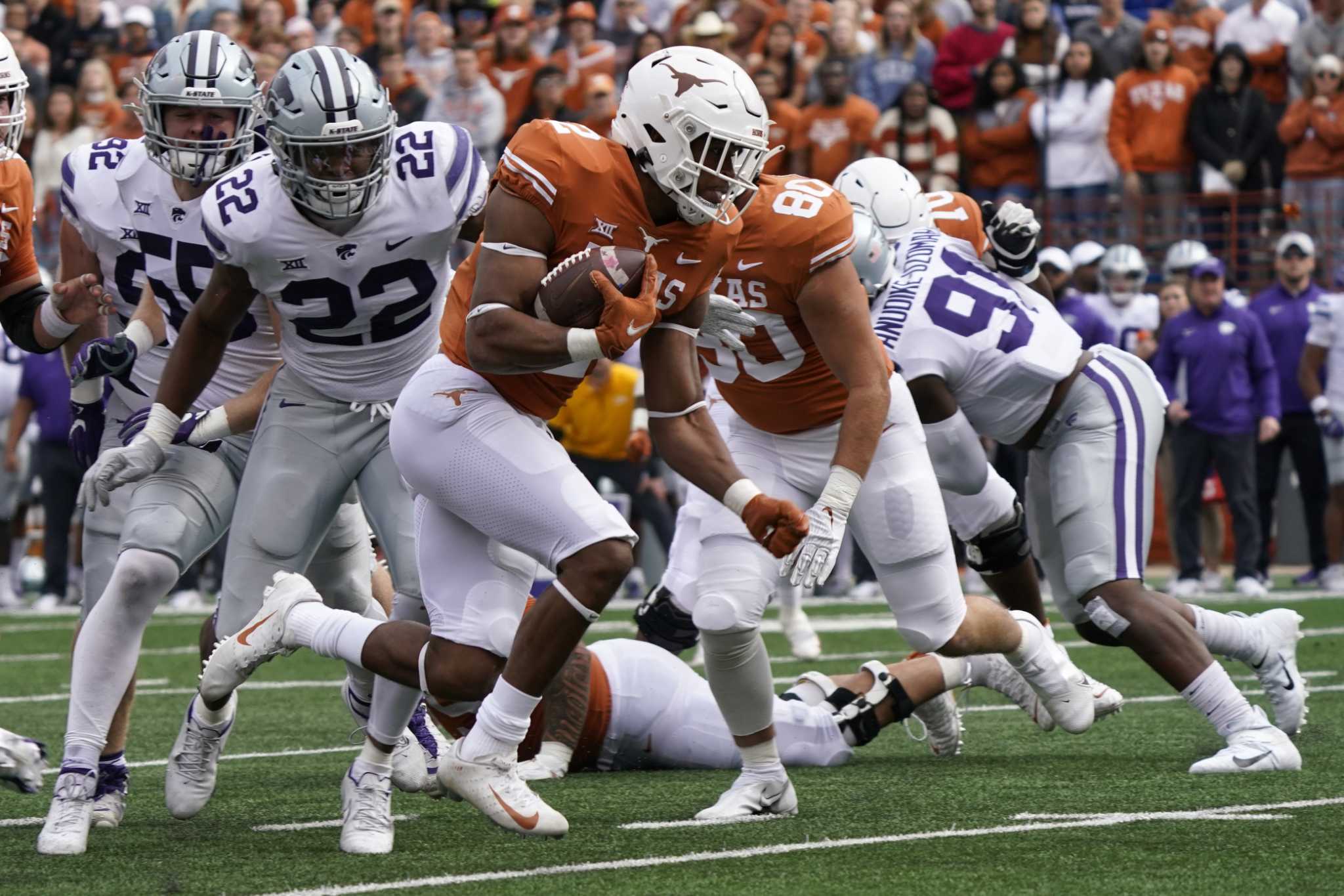 Texas' Keaontay Ingram (26) runs for a touchdown against Kansas State  during the second half of an NCAA college football game in Austin, Texas,  Saturday, Nov. 9, 2019. (AP Photo/Chuck Burton Stock