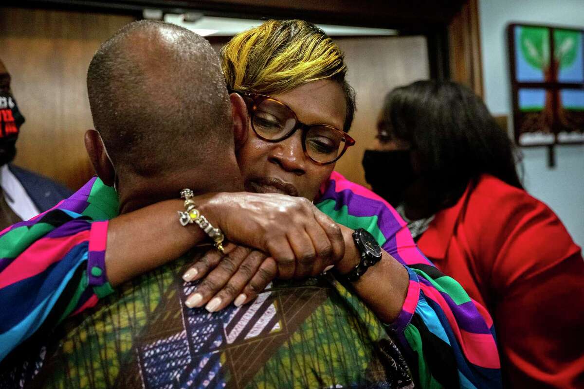 Ahmaud Arbery’s mother, Wanda Cooper-Jones, is hugged by a supporter after the jury convicted his killers. Many Americans, weren’t confident that would be the outcome.