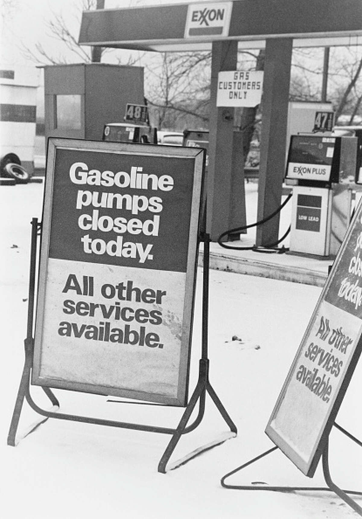 A sign at a gas station during the 1979 oil crisis, reading: Gasoline pumps closed today. All other services available.