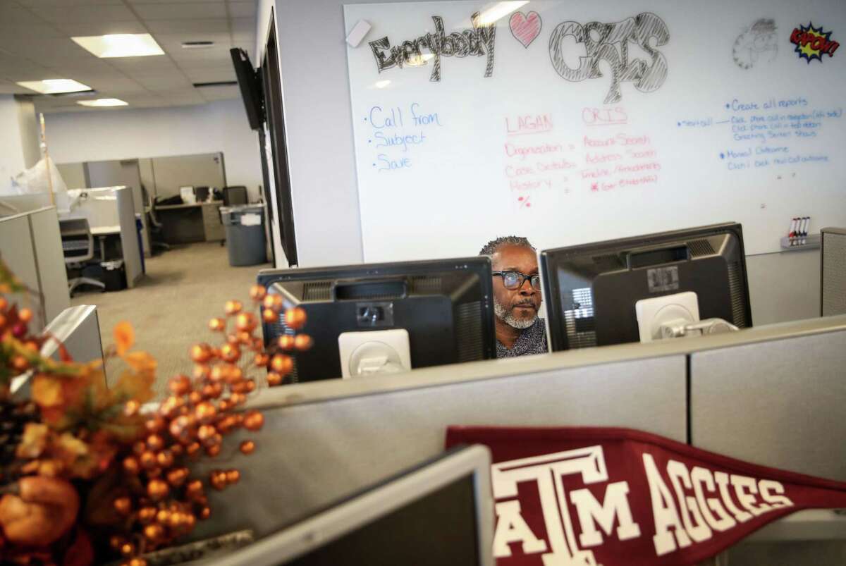 Derrick Moses works in the city’s 311 call center at a Houston Public Works building.