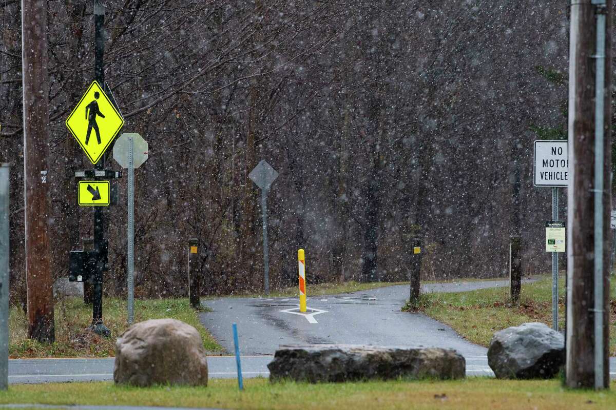 No bicyclist are seen on the Zim Smith Trail as snow falls in the afternoon on Friday, Nov. 26, 2021 in Ballston Spa, N.Y.