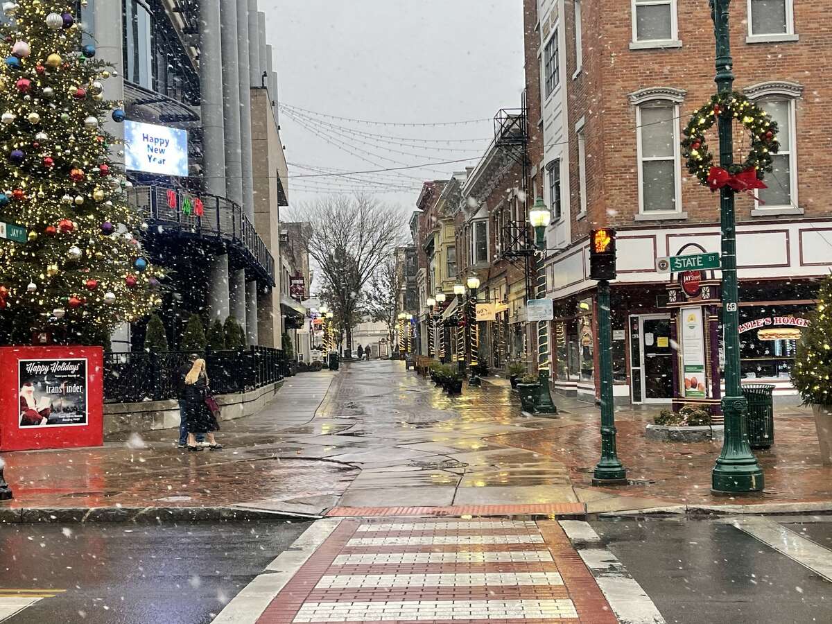 Snow falls in downtown Schenectady on Friday, Nov. 26, 2021. The first snowflakes of the 2021-2022 winter season logged at Albany International Airport on Friday were the second-latest on record, according to the National Weather Service in Albany.