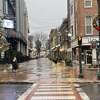 Snow falls in downtown Schenectady on Friday, Nov. 26, 2021. The first snowflakes of the 2021-2022 winter season logged at Albany International Airport on Friday were the second-latest on record, according to the National Weather Service in Albany.