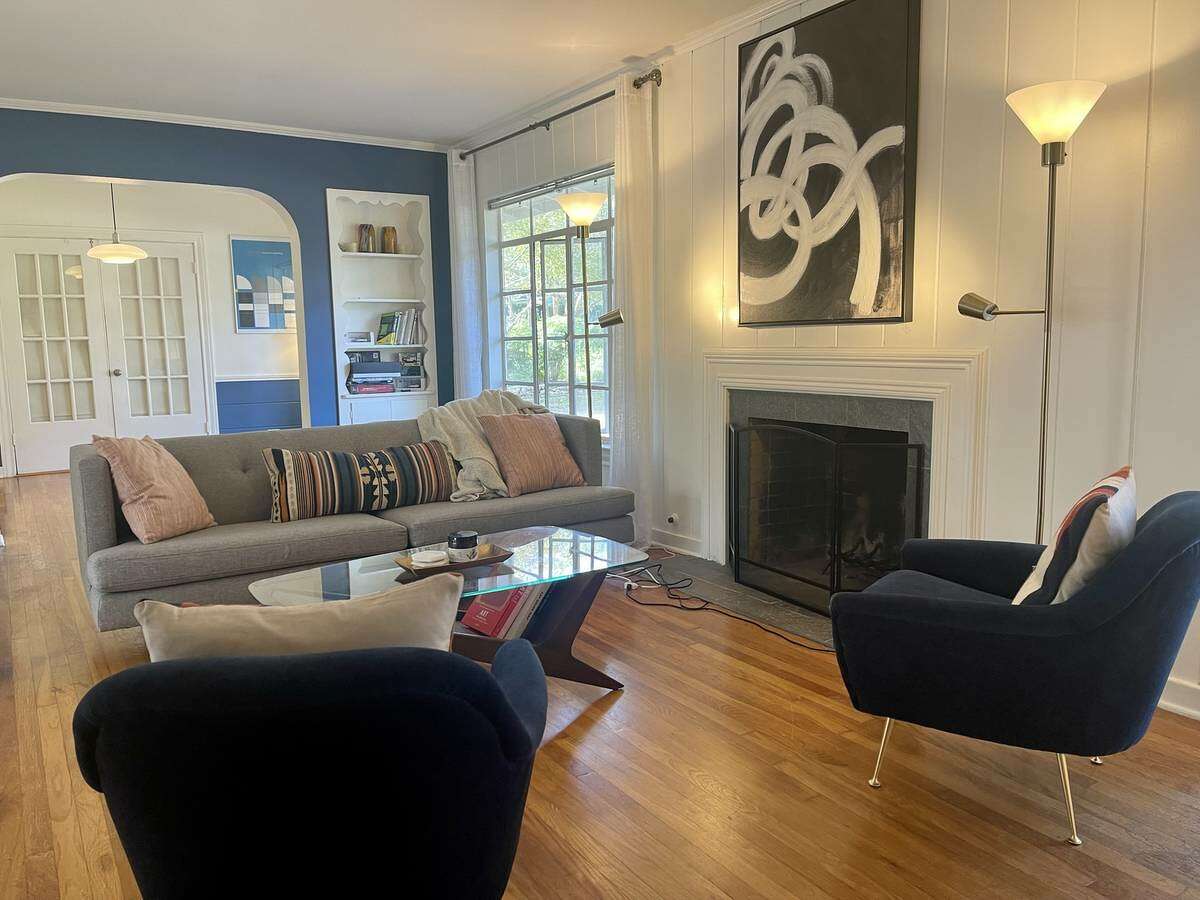 There's a already a living room in this house. Let's call this a drawing room.