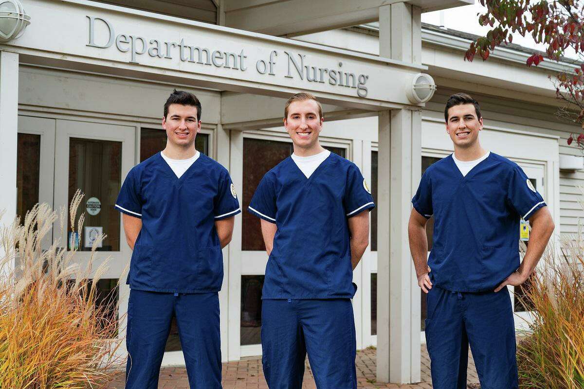 From left, Southern Connecticut State University nursing students and triplets Andrew, Zach and Luke Horobin.