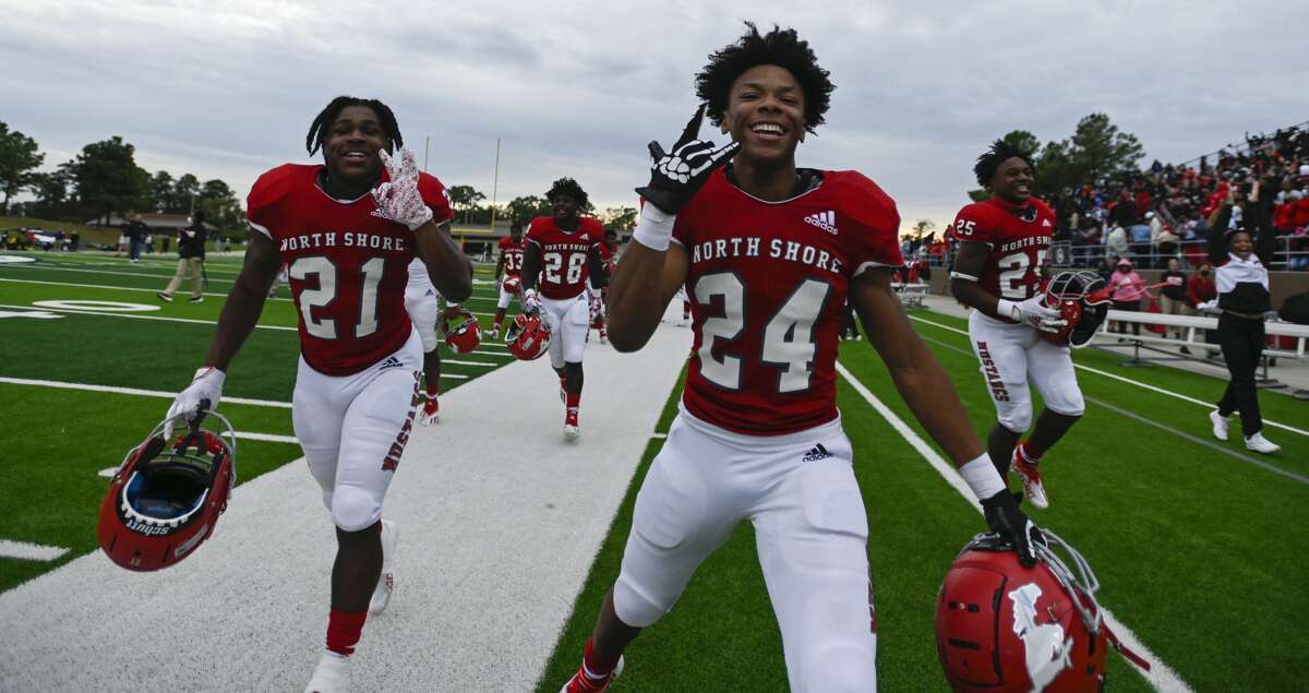 North Shore players react to winning a Class 6A Division I regional semifinal game against Tompkins Friday, Nov. 26, 2021, at Galena Park ISD Stadium in Houston.