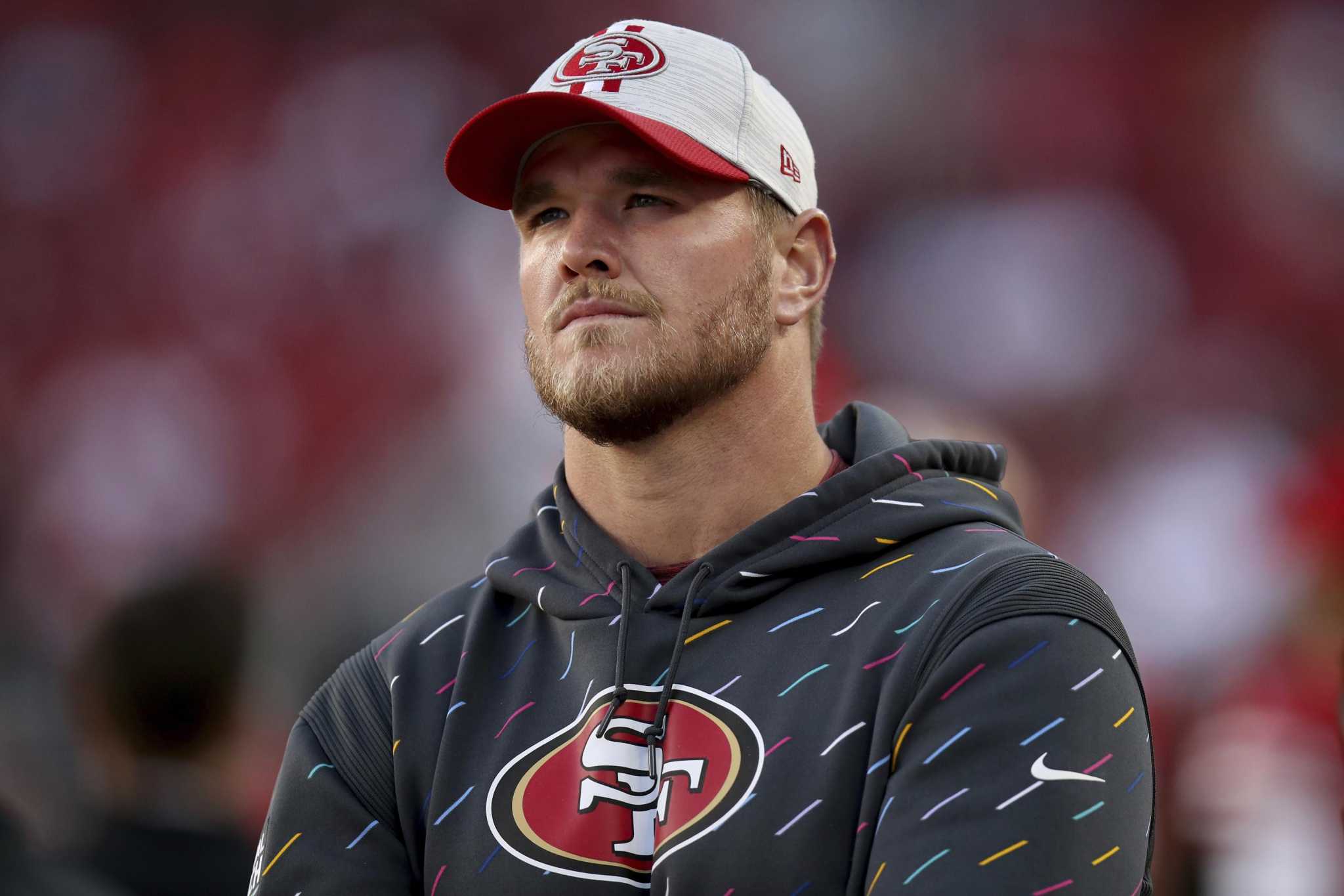 San Francisco 49ers Mike McGlinchey (69) is seen on the sideline during an  NFL football game against the Green Bay Packers, Sunday, Sept. 26, 2021, in  Santa Clara, Calif. (AP Photo/Scot Tucker