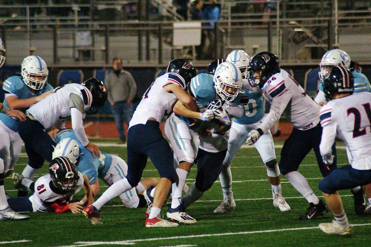 Cypress Christian’s Cody Andrus (33), shown in a file photo, scored one of two touchdowns for the Warriors in a victory over Lubbock Trinity.