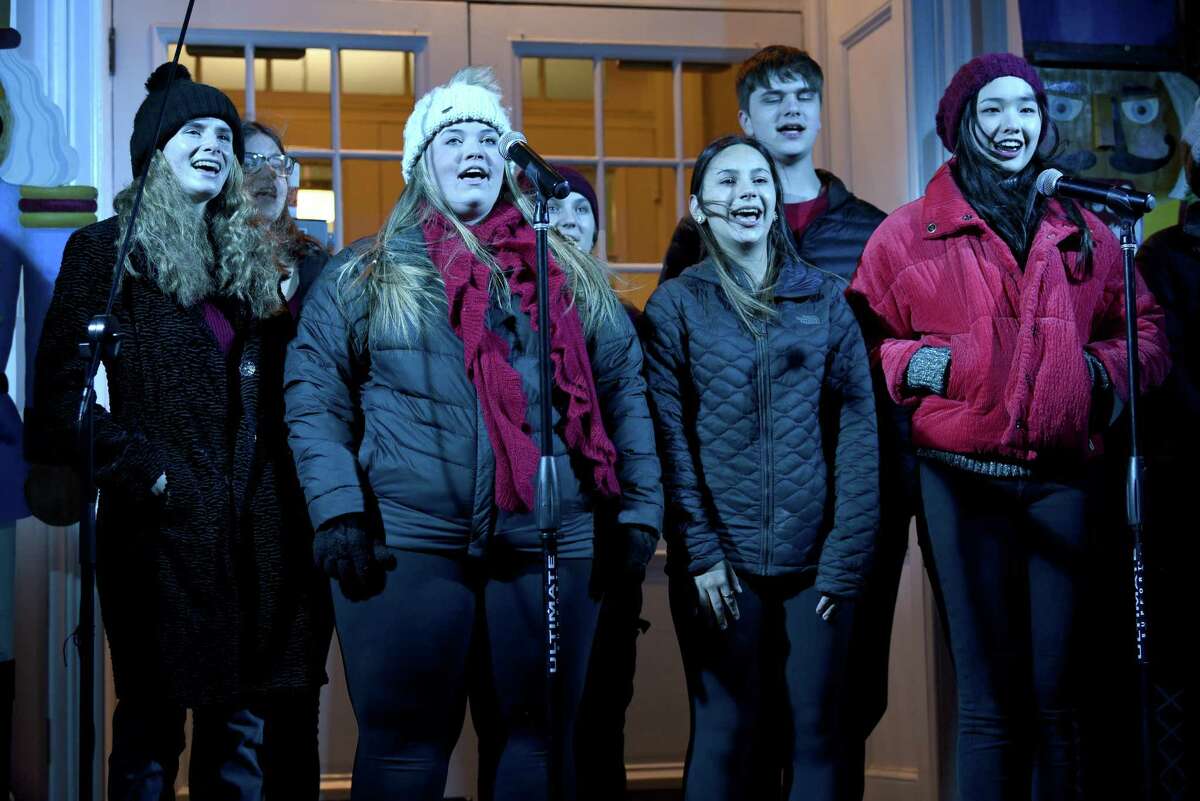 The Nightengales sing holiday songs on the steps of Town Hall. Ridgefield welcomed the holiday season on Nov. 26 with 17,000 lights, songs and a visit from Santa and Mrs. Claus.