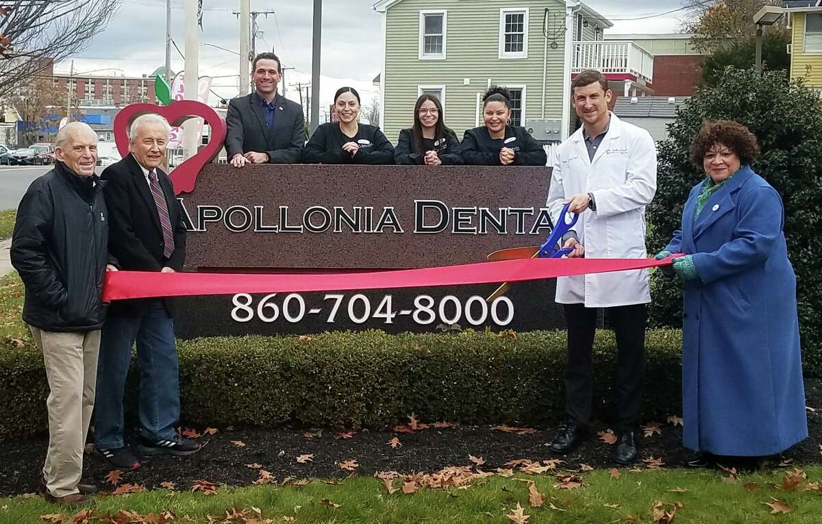 Apollonia Dental in Middletown celebrated its grand reopening Nov. 15. From left are Middlesex County Chamber of Commerce President Larry McHugh, Deputy Mayor Vincent Loffredo, Chamber Vice President Jeffrey Pugliese, dental hygienist Krista, office manager Amanda, dental assistant Genesis, owner Dr. James McGrath, and Central Business Bureau Chairwoman Pamela Steele.
