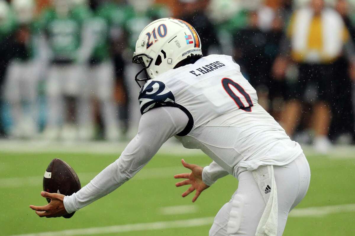 DENTON, TEXAS - NOVEMBER 27: Frank Harris #0 of the UTSA Roadrunners bobbles the ball as he scramble out of the pocket in the second quarter against the North Texas Mean Greenat Apogee Stadium on November 27, 2021 in Denton, Texas. (Photo by Richard Rodriguez/Getty Images)