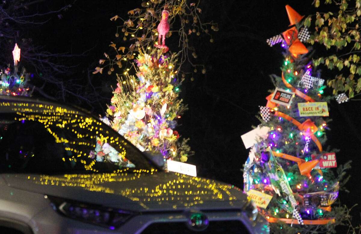Lights from Christmas Trees reflect off of cars going through Christmas Wonderland at Rock Spring Park during opening night Friday. The annual display features approximately 4 million lights, and will continue through Dec. 27.