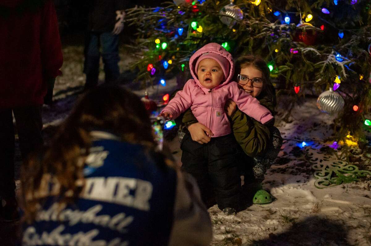 People gather in Coleman to light the town's Christmas tree on Nov. 27, 2021.