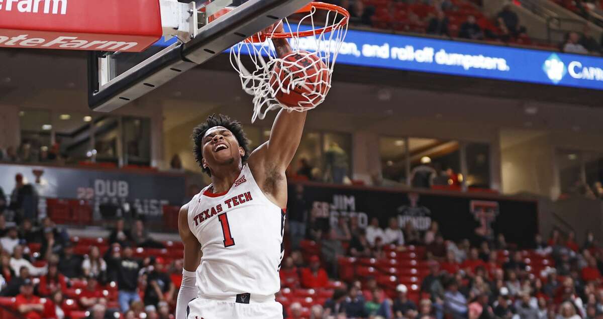 Texas Tech's Terrence Shannon, Jr. (1) dunks the ball during the second half of an NCAA college basketball game against Lamar on Saturday, Nov. 27, 2021, in Lubbock, Texas. (Brad Tollefson/Lubbock Avalanche-Journal via AP)