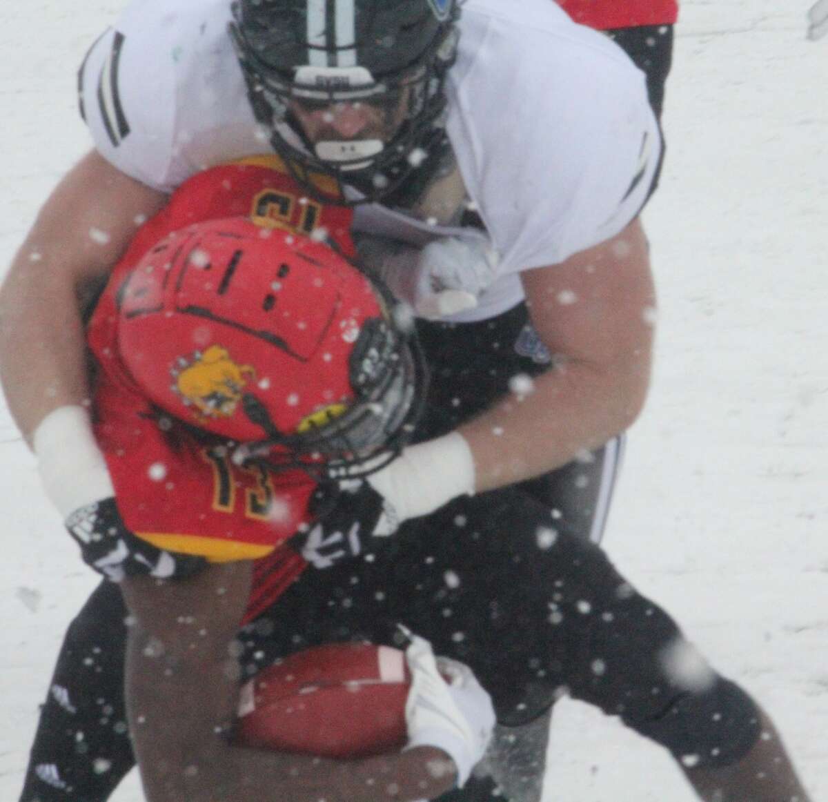 Ferris State's CJ Jefferson (13) is brought down by the Grand Valley defense on Saturday.