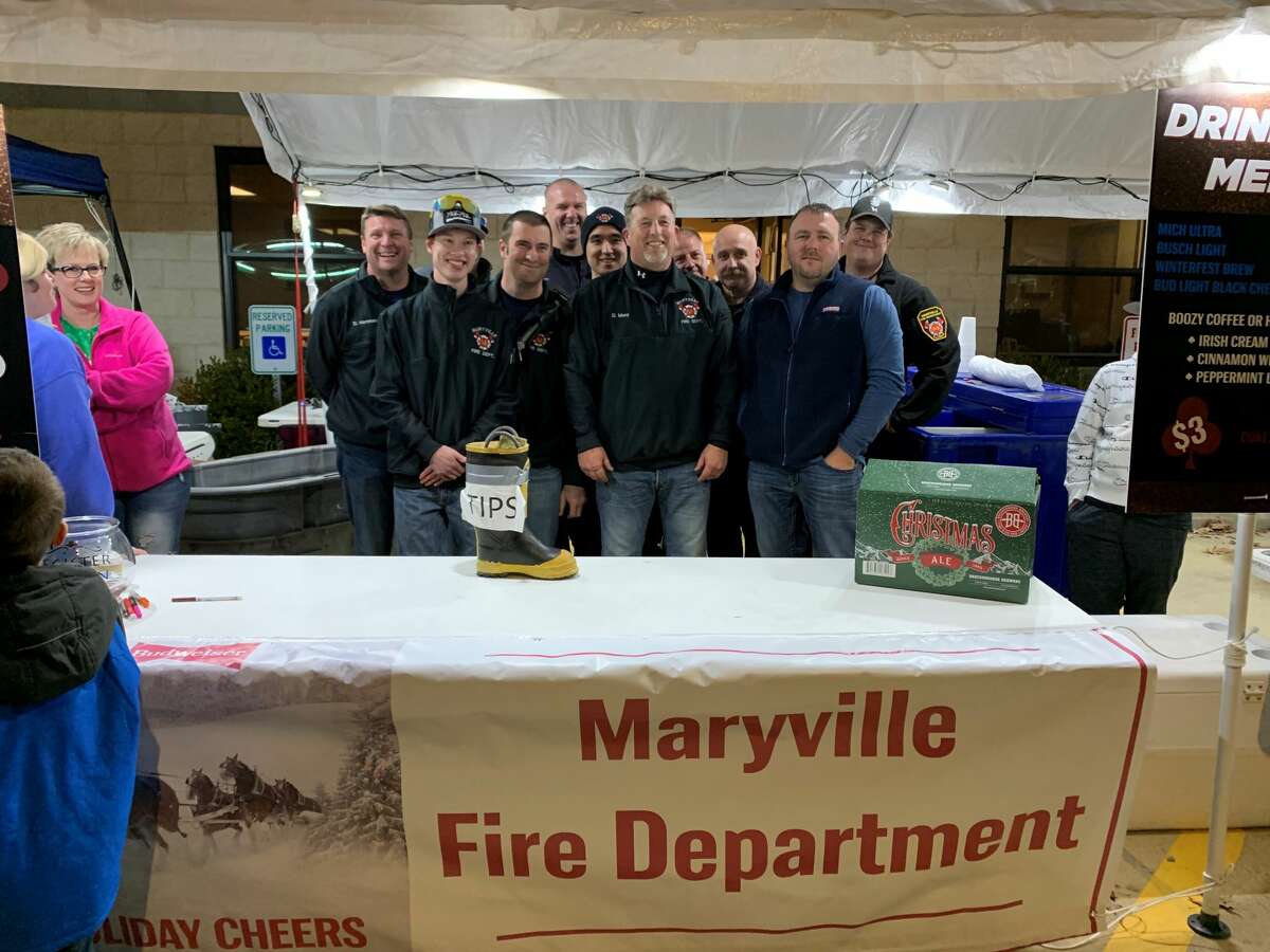 Members of the Maryville Fire Department at the Maryville Winter Market on Saturday. 