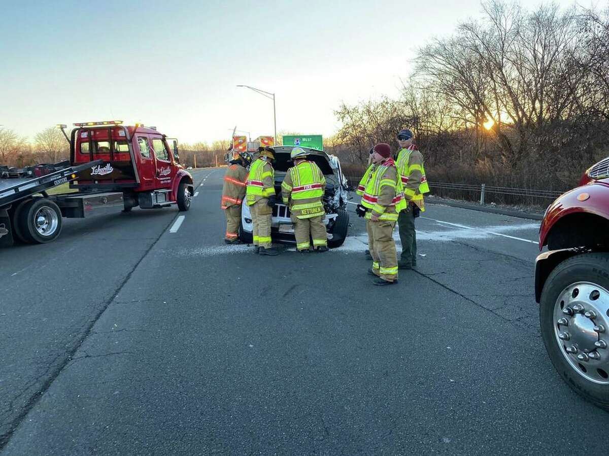 First responders work at the scene of a crash on Route 7 in Brookfield Saturday afternoon. The accident resulted in at least one injury and a temporary closure of the highway.