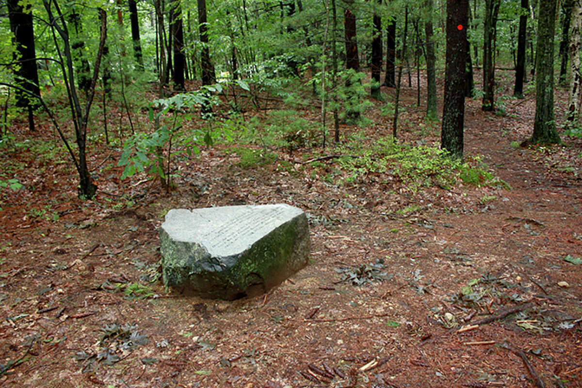 A boulder marks the location where Brister Freeman's house is thought to have stood in Walden Woods.
