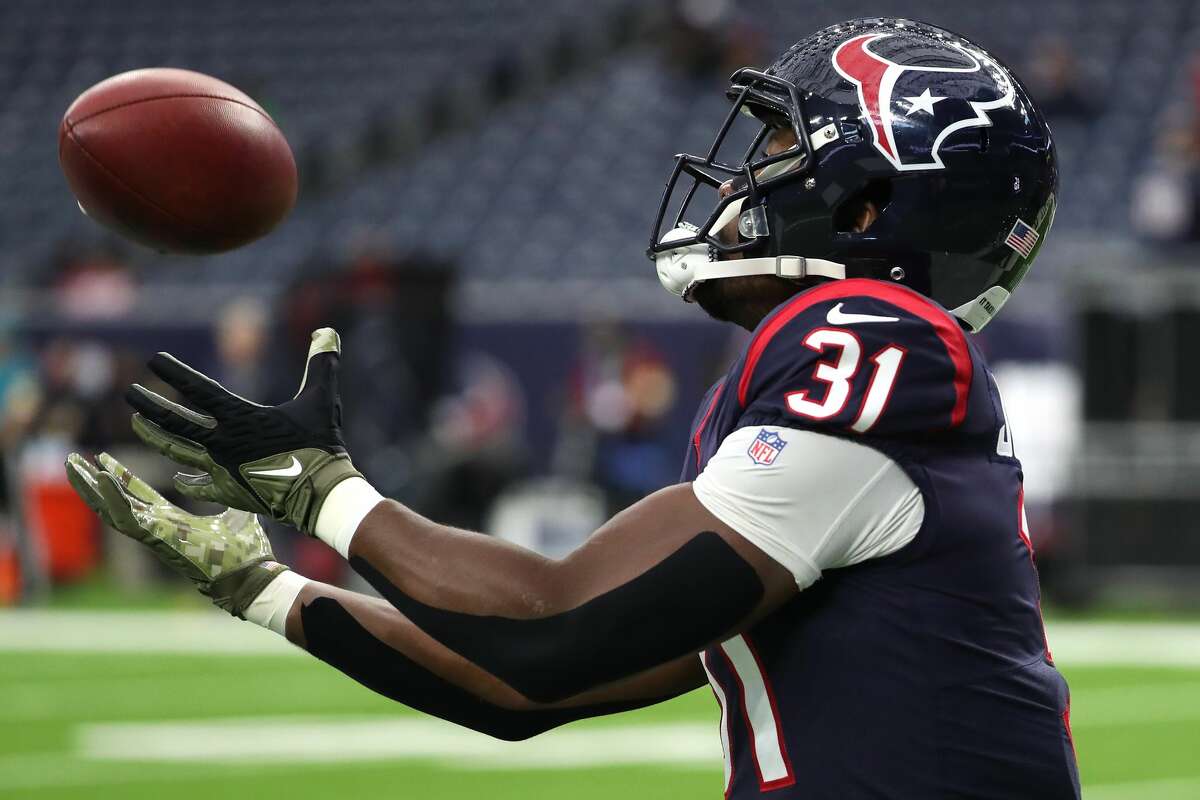Houston Texans running back David Johnson catches a ball as he warms up before an NFL football game against the New York Jets Sunday, Nov. 28, 2021 in Houston.
