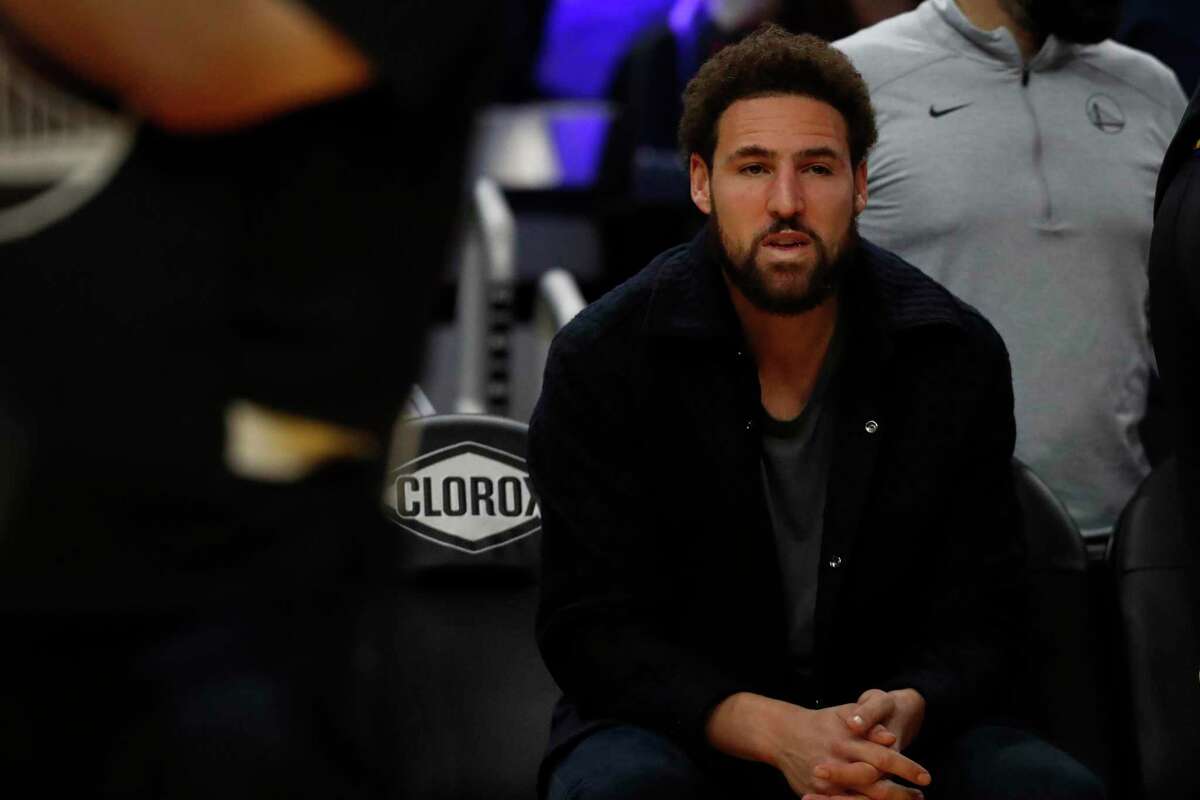 Golden State Warriors guard Klay Thompson is seen on the bench during the fourth quarter of his NBA basketball game against Portland Trail Blazers in San Francisco, Calif. Friday, Nov. 26, 2021.