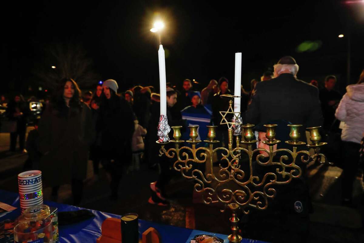 The 18-foot menorah outside the Stew Leonard’s Norwalk store was lit Sunday to mark the first night of Hanukkah.